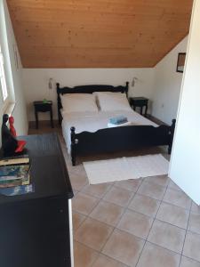 Postel nebo postele na pokoji v ubytování Apartments Bianki