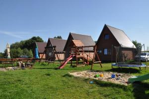 a yard with a bunch of playground equipment at KANZAS in Jarosławiec