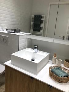 Kylpyhuone majoituspaikassa JACARANDA II Appartement