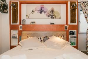 Cama o camas de una habitación en Casa Bisou Italia con SPA