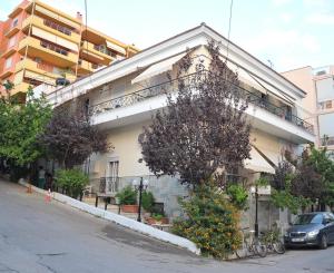 a building with bikes parked in front of it at Armonia Central in Loutra Edipsou