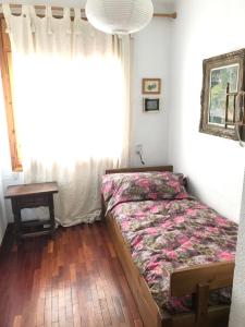 A bed or beds in a room at La rotonda de Llívia