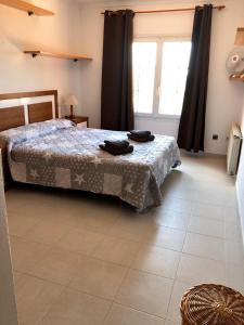 A bed or beds in a room at Casa Pepe