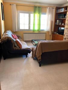 A bed or beds in a room at Casa Pepe