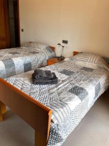 A bed or beds in a room at Casa Pepe