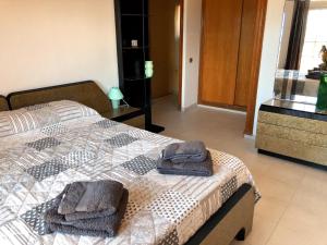 A bed or beds in a room at Casa Pepe