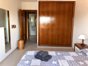 A bed or beds in a room at Casa Pepe