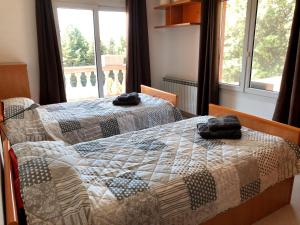 A bed or beds in a room at Casa Pepe