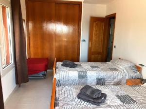 A bed or beds in a room at Casa Pepe