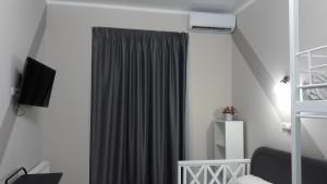 TV a/nebo společenská místnost v ubytování 10 Fontana House Mykonos