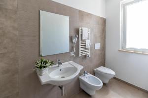 A bathroom at Vasto Aparthotel