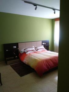Ein Bett oder Betten in einem Zimmer der Unterkunft LA CASA DE BELTZA