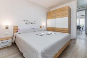 Postel nebo postele na pokoji v ubytování Apartment Sole
