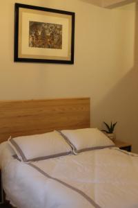 Postel nebo postele na pokoji v ubytování Hospedaje Donaji