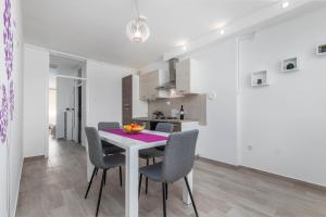 Kuchyň nebo kuchyňský kout v ubytování Apartment Sole