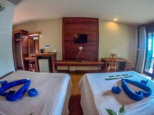Voodi või voodid majutusasutuse The Cinnamon & SaphanSufan Resort Kohmak toas
