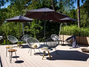 Vonkajšia záhrada v ubytovaní Apartamenty DECK Jurata