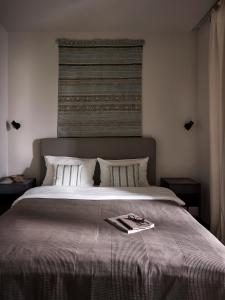 Posteľ alebo postele v izbe v ubytovaní Apartamenty DECK Jurata