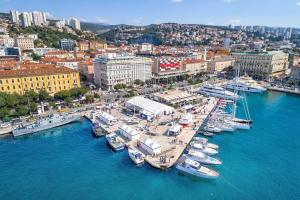 an aerial view of a marina with boats in the water at VenaRi apartments, Rijeka in Rijeka