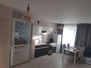 Postel nebo postele na pokoji v ubytování Vanilla Sky Apartments