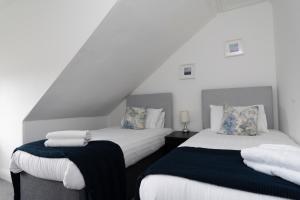 Ένα ή περισσότερα κρεβάτια σε δωμάτιο στο GreenStar Apartments - Short Walk Away Into Dundee City Centre - Next To Abertay University - Perfect For Your Short or Long Stays - Weekly & Monthly Offers For Your Longer Stays