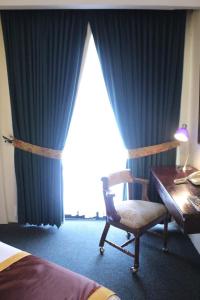 Letto o letti in una camera di Apart Hotel La Cordillera