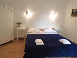 Posteľ alebo postele v izbe v ubytovaní Golden B&B