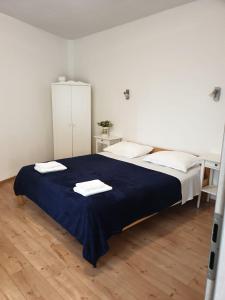 Posteľ alebo postele v izbe v ubytovaní Golden B&B