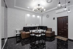 Гостиная зона в Apartments Arcadia. Gagarin Plaza