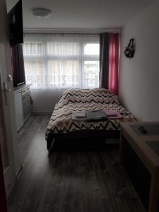 Łóżko lub łóżka w pokoju w obiekcie Leszkowo