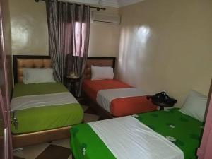 Säng eller sängar i ett rum på Marrakech Family appartements