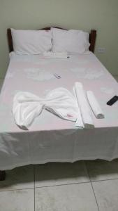 En eller flere senge i et værelse på Pousada Bela Vista