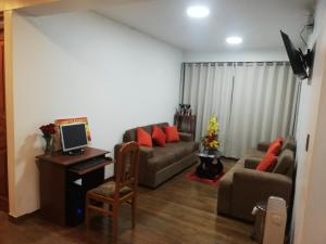 TV a/nebo společenská místnost v ubytování Real House Cusco