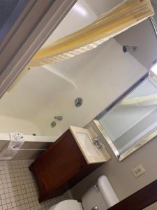 an overhead view of a bathroom with a sink at Orbits Inn in Somerset +22 photos