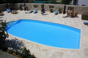 Bazén v ubytování Apartments Villa Olga nebo v jeho okolí