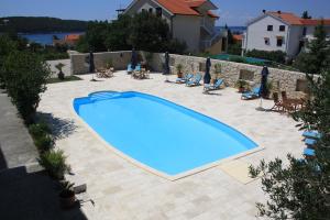 Bazén v ubytování Apartments Villa Olga nebo v jeho okolí