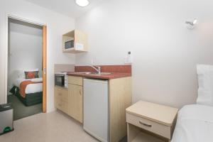 Kuchyň nebo kuchyňský kout v ubytování Bella Vista Motel Lake Wanaka