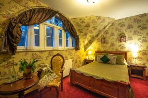 Posteľ alebo postele v izbe v ubytovaní Rezydencja Grawert Boutique & Spa
