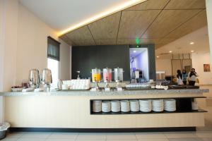 Nápoje v ubytování Hotel Adya Express Chenang