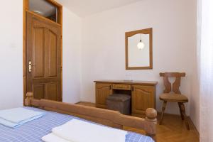 Postel nebo postele na pokoji v ubytování Rooms Miramare