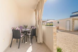 Балкон или терраса в Apartments Sestanka