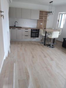 Kuchyň nebo kuchyňský kout v ubytování Apartments Lorio
