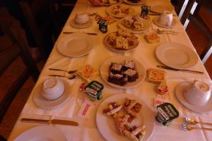 a table with plates of food on top of it at Difesa del Principe in Felitto