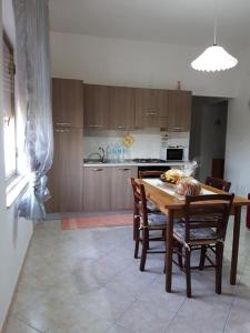 Kuchyňa alebo kuchynka v ubytovaní La Casa Di Donato E Maria