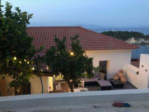 a view of a house from a balcony at Casa Laryssiou in Gythio