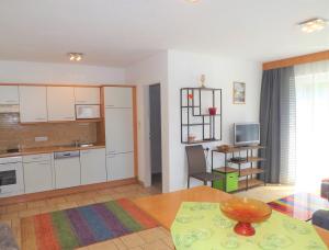Kuchyňa alebo kuchynka v ubytovaní Apartments Scheffau