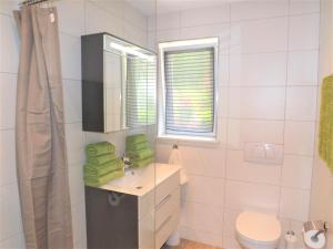 Kúpeľňa v ubytovaní Apartments Scheffau + 19 fotografií