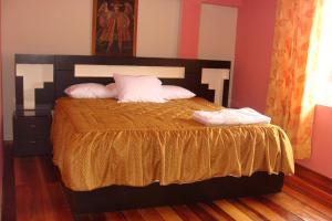 Katil atau katil-katil dalam bilik di Hostal Qolqampata
