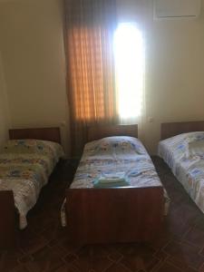 Rúm í herbergi á House Dea Dea