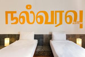 Postel nebo postele na pokoji v ubytování Villa Shanti - Heritage Hotel for Foodies
